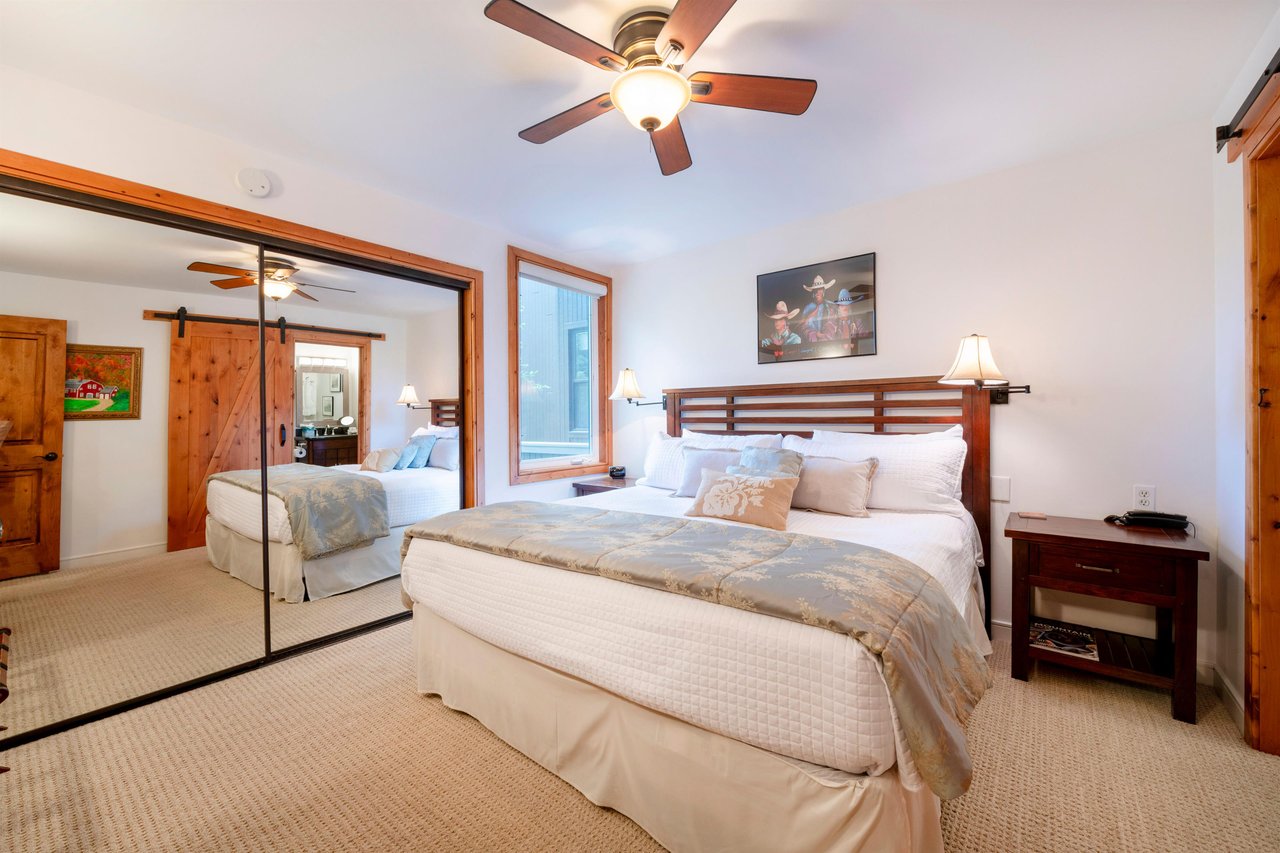 Three Kings 93 provides generous and comfortable king bedroom accommodations with classic mountain furnishings and mirrored closets, making it an ideal Park City vacation rental for a relaxing and rej