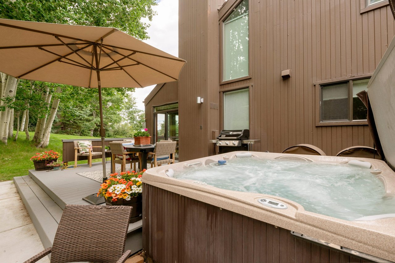 Three Kings 93 features its own private hot tub nestled on the deck among the trees — the ultimate way to unwind after a day of adventure and a luxurious perk that sets this Park City condo rental apa