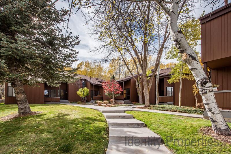 The lush, parklike grounds surrounding Three Kings 93 create a serene and welcoming atmosphere, perfectly complementing the warmth and character of this exceptional Park City lodging destination.