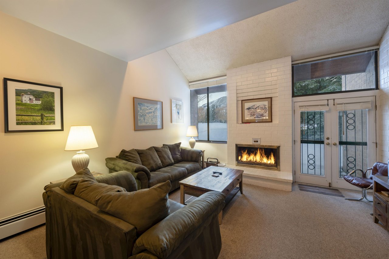 Cozy up by the fireplace and let the mountain vacation begin.