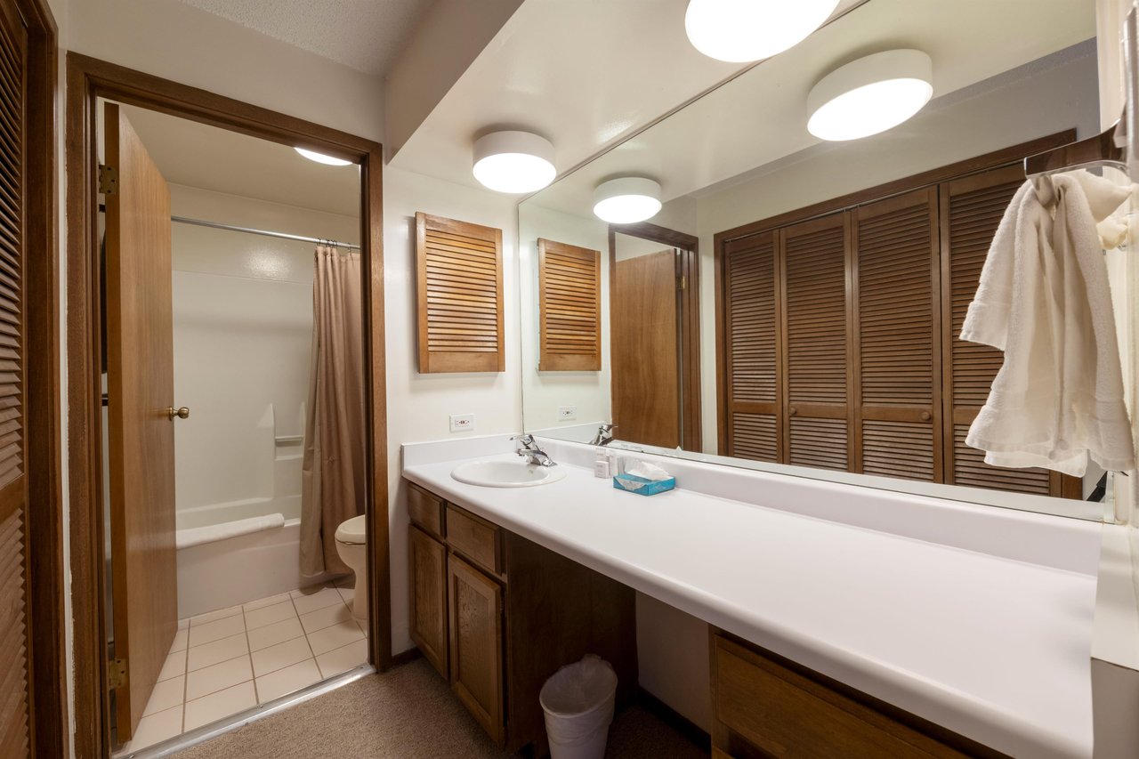 Get ready for another day of adventure in the spacious and wellappointed bathroom at Park Avenue 268.