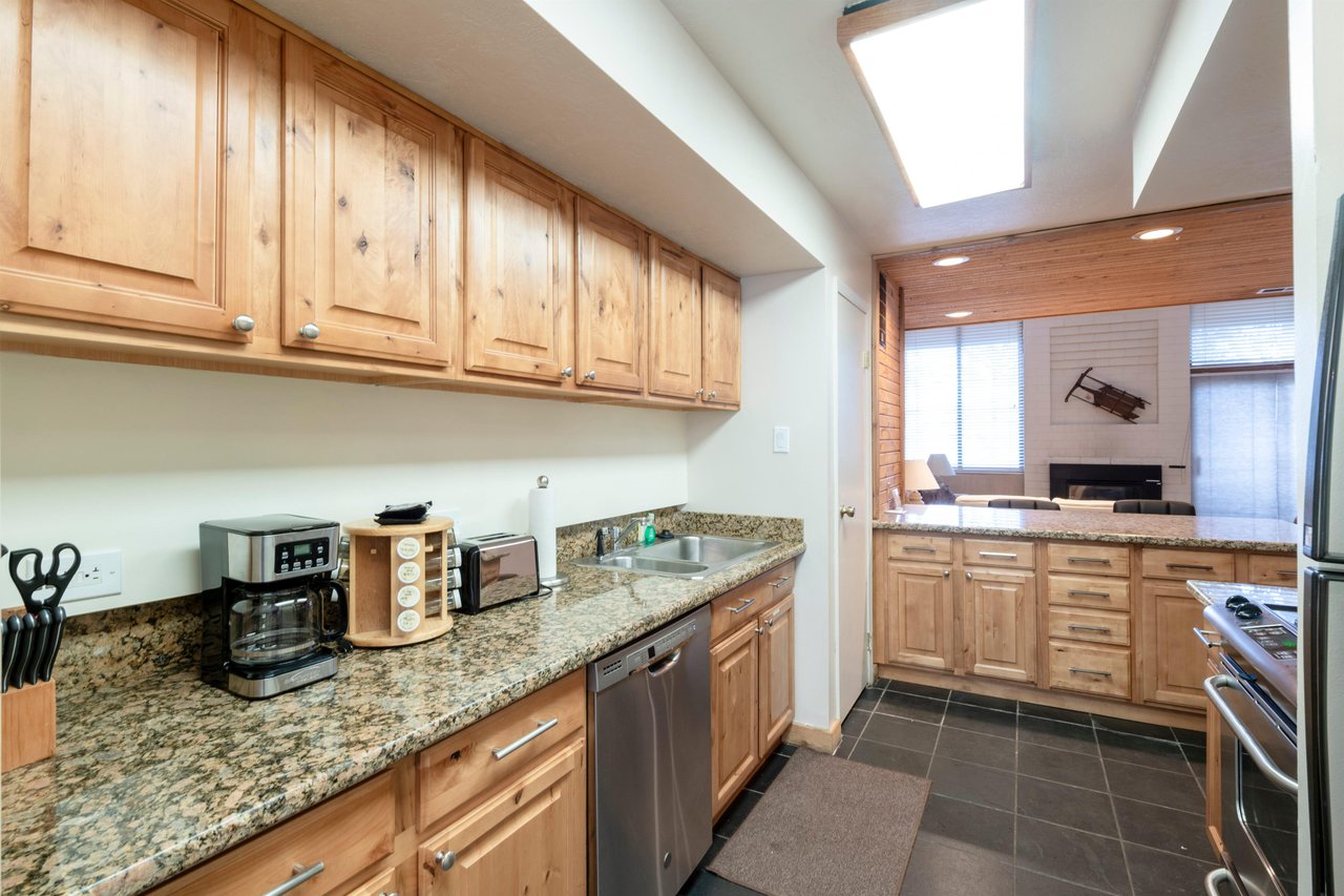 Cook and gather in the full sized kitchen at Park Avenue 292. This Park City condo rental makes it easy to feel right at home during your stay.