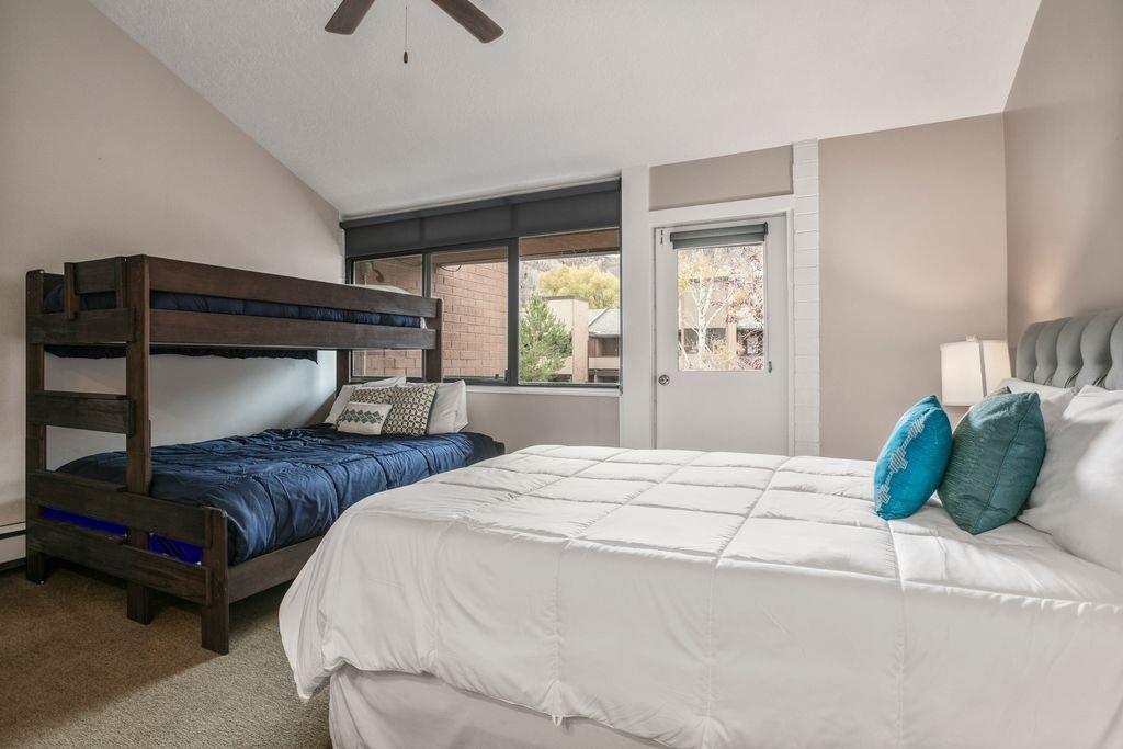 Plenty of room for everyone in the second bedroom at Park Avenue 296. With a queen bed and one set of bunk beds, this flexible sleeping space makes this Park City condo rental an ideal choice for fami