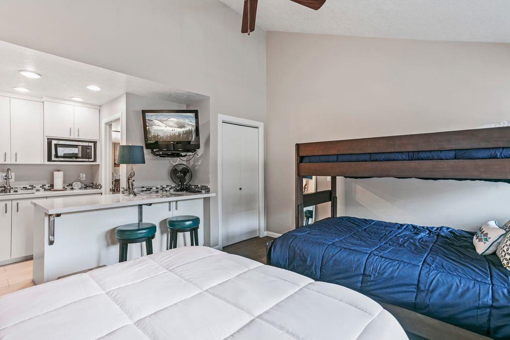 Plenty of room for everyone in the second bedroom at Park Avenue 296. With a queen bed and twin over full bunk bed, this smartly designed space makes this Park City condo rental an ideal choice for fa