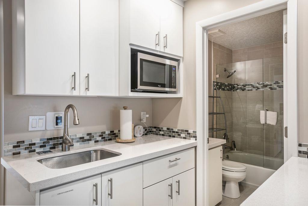 Privacy and convenience come together in the second bedroom suite at Park Avenue 296. With a private kitchenette and en suite bathroom.