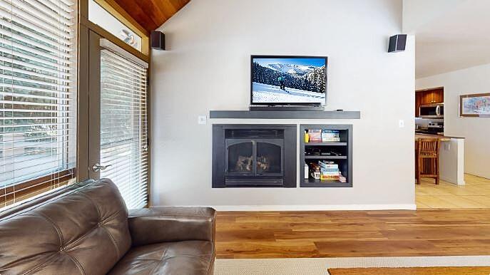 Movie nights just got better at Pay Day 189 Cozy up by the fireplace, flip on the flatscreen, and let the mountain magic do the rest.