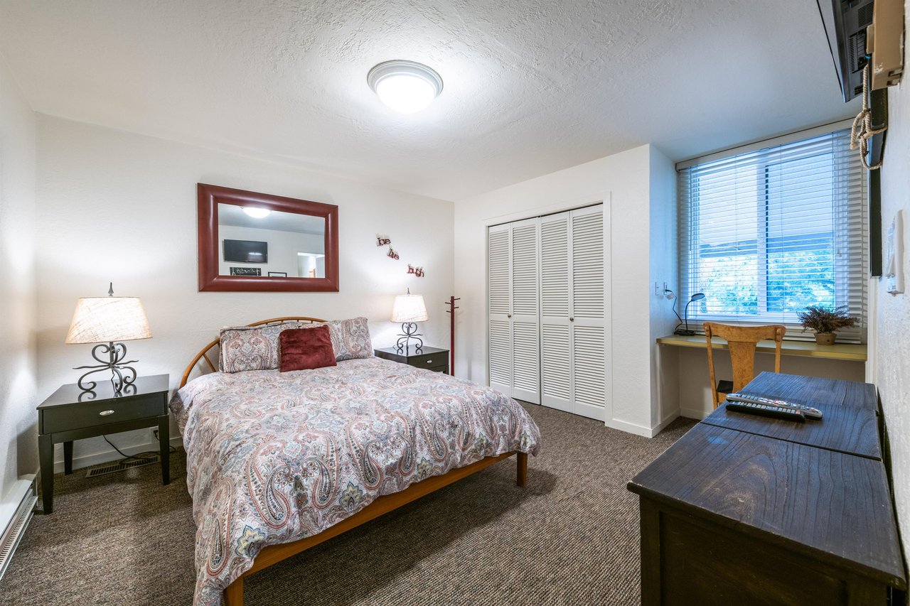 The quiet and comfortable bedroom at Pay Day 183 offers everything you need for a restful stay. Wake up refreshed and ready to explore in this toprated Park City vacation rental.