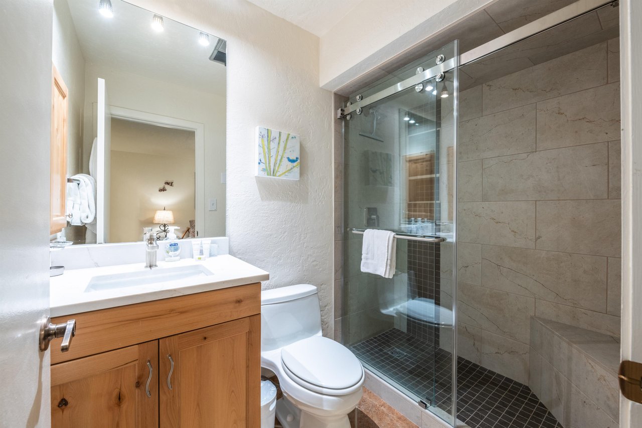 The sleek glassenclosed shower at Pay Day 183 is the perfect way to unwind after a day on the mountain. Clean, modern, and thoughtfully designed.