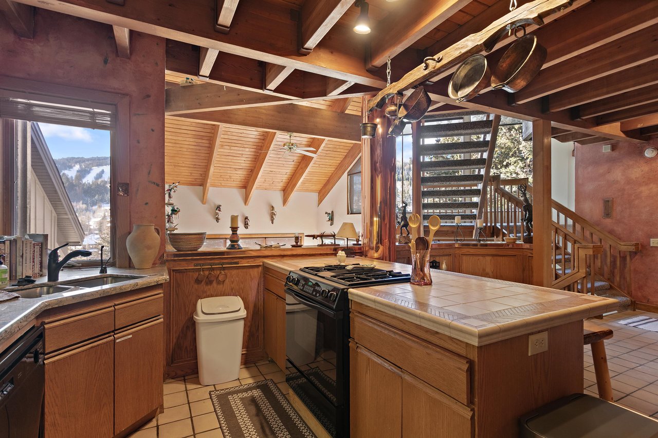 A wellappointed kitchen with everything you need at 1296 Pinnacle — one of Deer Valleys most charming vacation rentals.