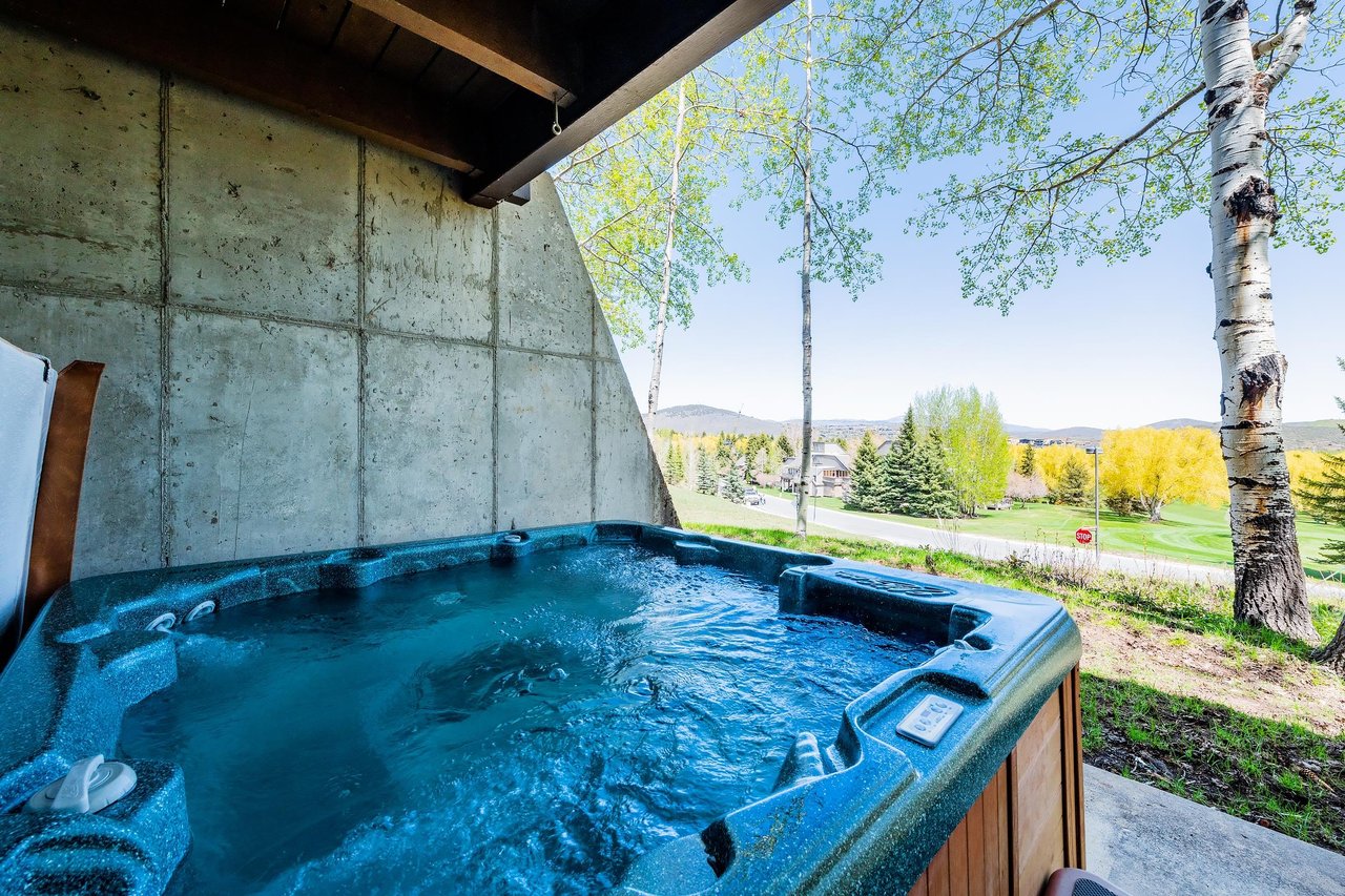 Soak in the private outdoor hot tub at Temptation 8 while taking in stunning mountain views — the perfect way to unwind after a day on the slopes.