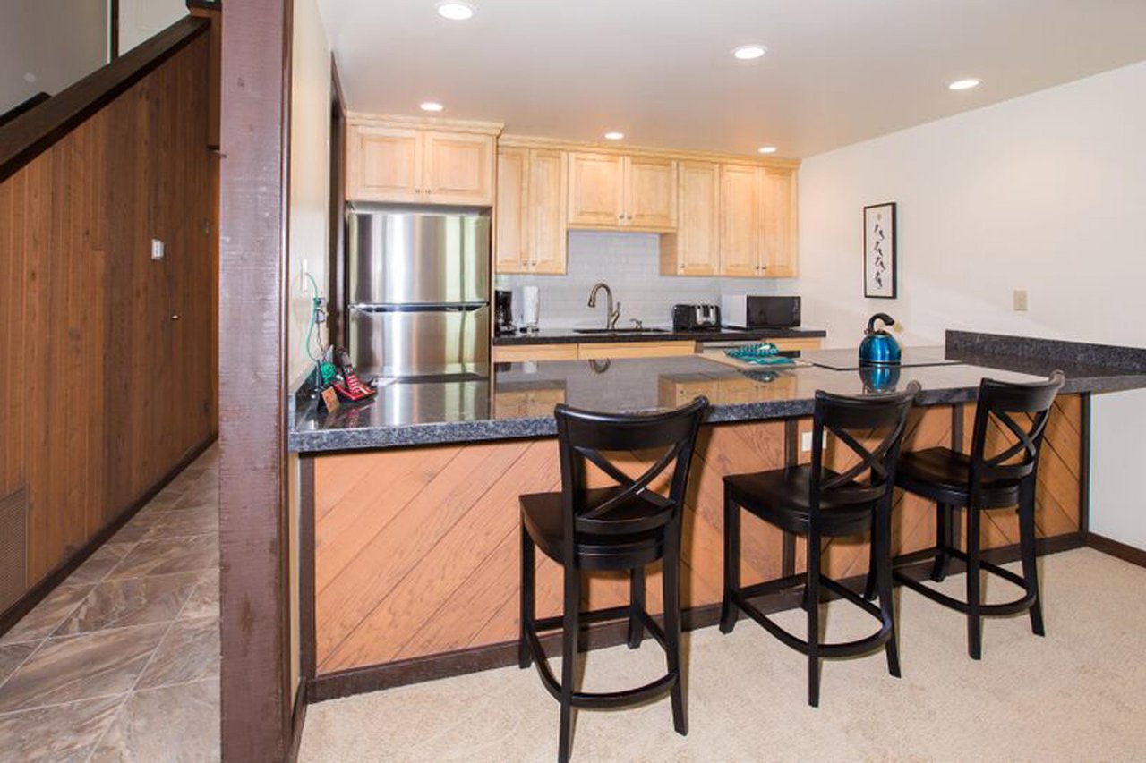 Three Kings 37 delivers a premium culinary experience with a beautifully designed kitchen featuring a generous breakfast bar, quality finishes, and everything you need to feel right at home during you
