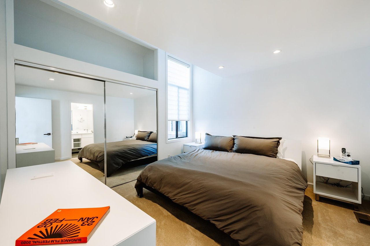 Three Kings 80 offers a sleek and spacious king bedroom with floortoceiling mirrored closets and contemporary furnishings.