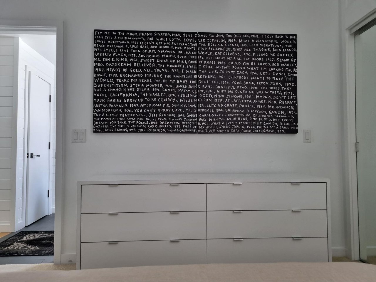 Three Kings 80 makes a bold artistic statement with striking largescale wall art and sleek modern furnishings.