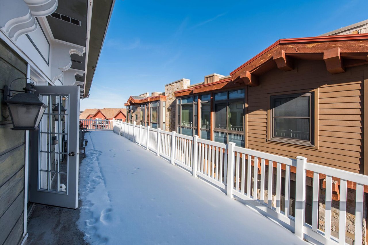 Fresh snow and mountain charm surround Resort Plaza 5007.