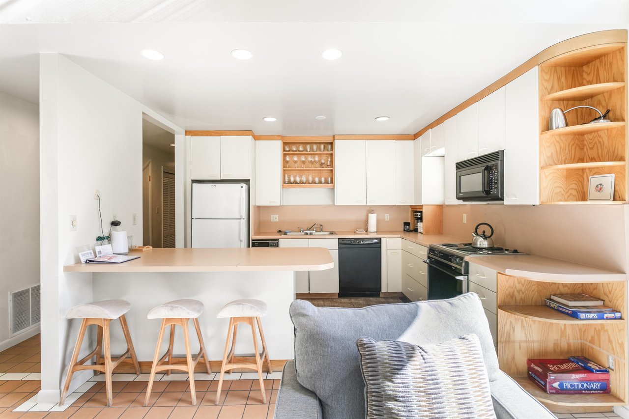 he openconcept kitchen and living area flows together comfortably — pull up a seat at the breakfast bar or settle onto the sofa after a day outdoors.