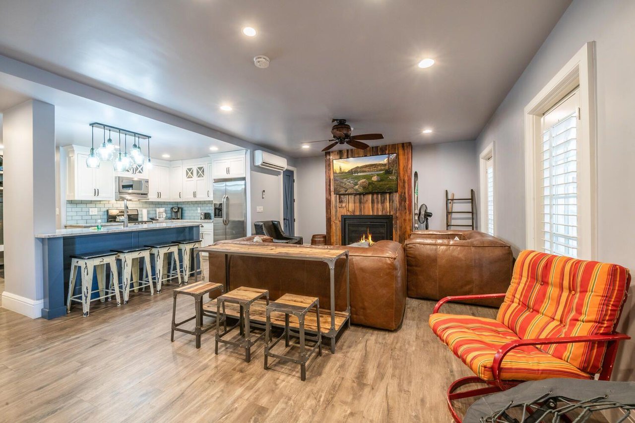 The openconcept layout at Resort Plaza 5000 flows naturally from the living area into the dining space — a thoughtfully designed Park City vacation rental that keeps the whole group connected and com