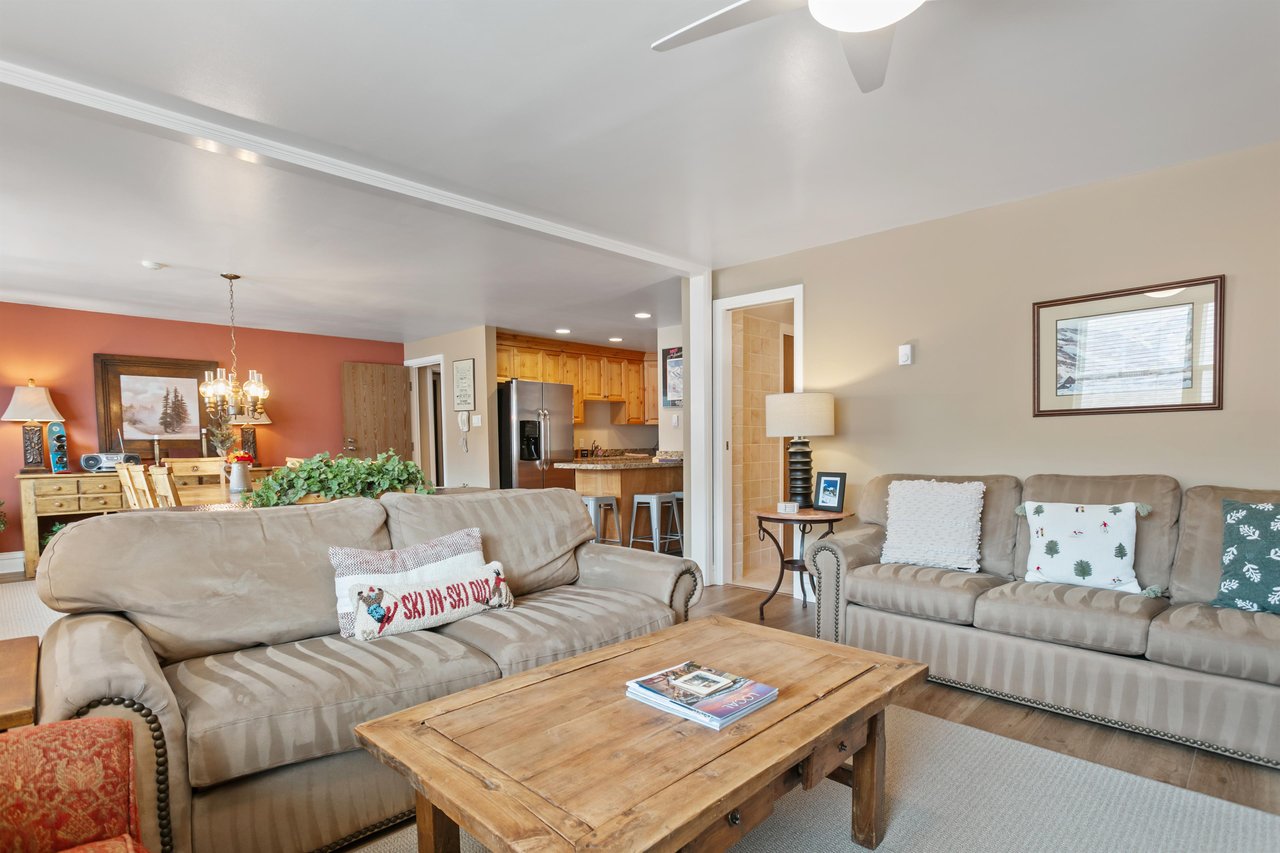 Cozy up by the fireplace and let the stresses of everyday life melt away in the warm and comfortable living room at Resort Plaza 5064, a Park City condo rental that creates the perfect ambiance for a