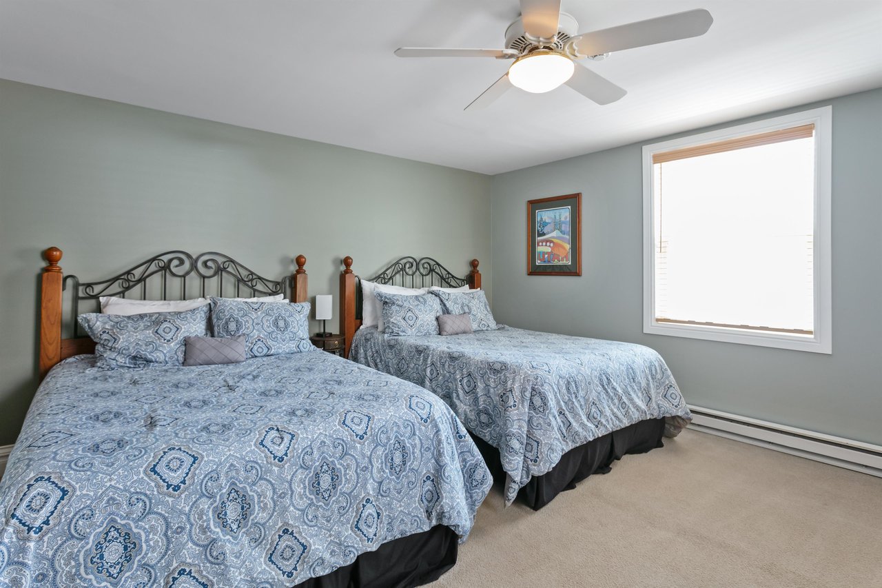 Resort Plaza 5064 ensures every guest sleeps in comfort, with a generously sized double queen bedroom that offers ample space, modern amenities, and a relaxing atmosphere that sets this Park City cond