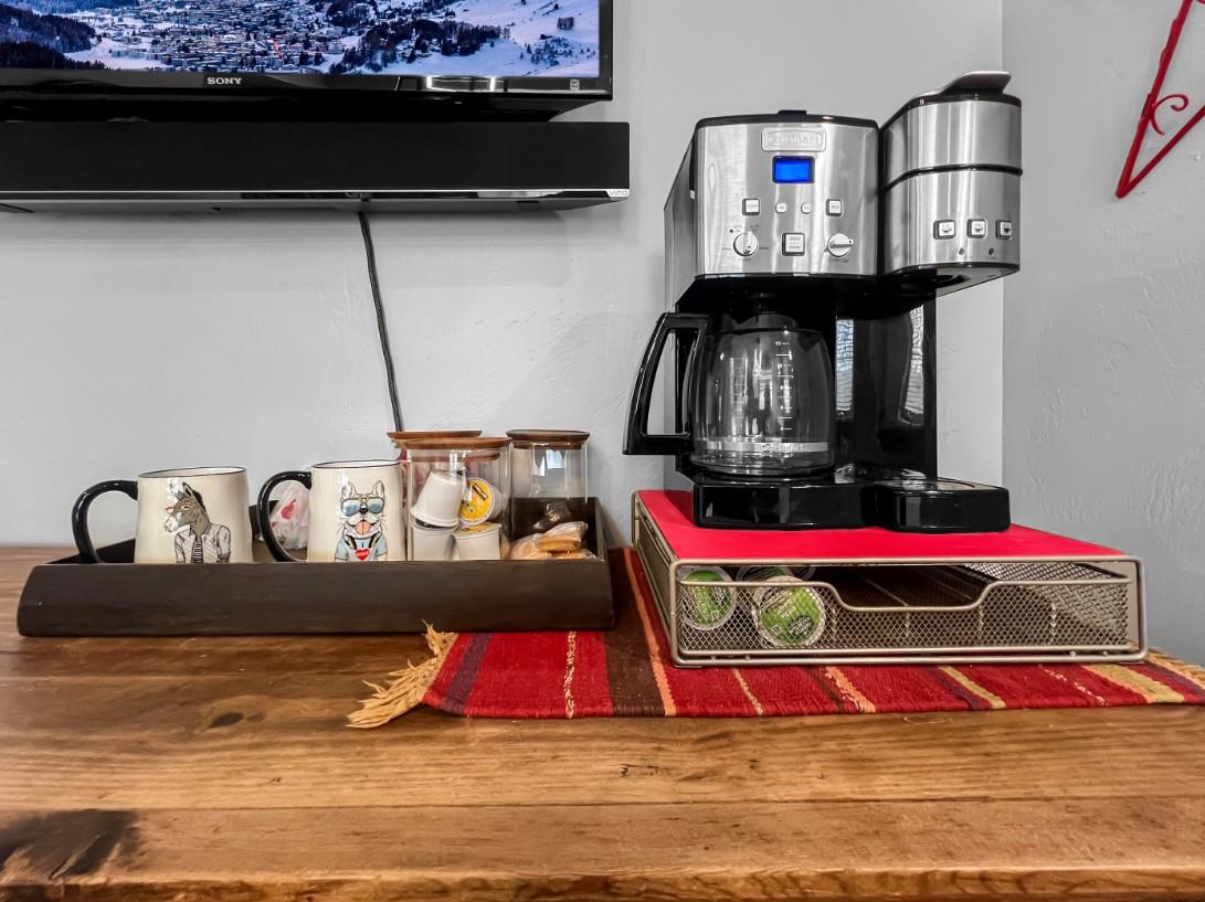 Start your mornings right with fresh coffee and tea at your fingertips, ready to fuel your mountain adventures.