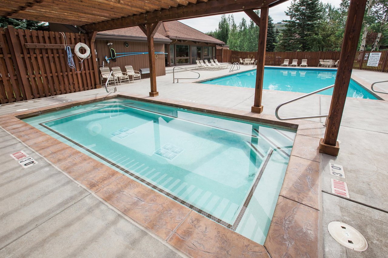 After a day on the slopes or the golf course, unwind in the yearround outdoor pool and hot tub — just one of the many perks of choosing a Three Kings vacation rental.