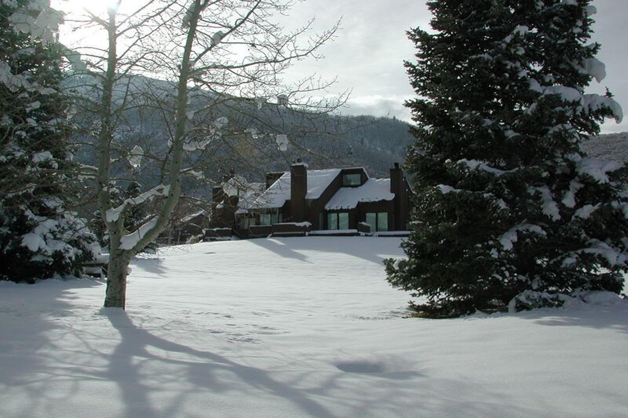 Three Kings 80 is a stunning winter wonderland retreat, nestled in a serene snowy setting that perfectly captures the magic of a Park City lodging experience during ski season.