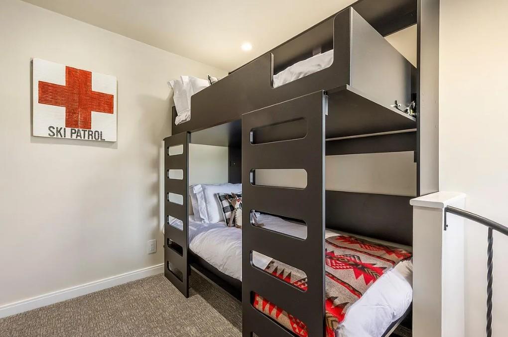 Twinovertwin bunk beds in the upstairs loft bedroom, with TV