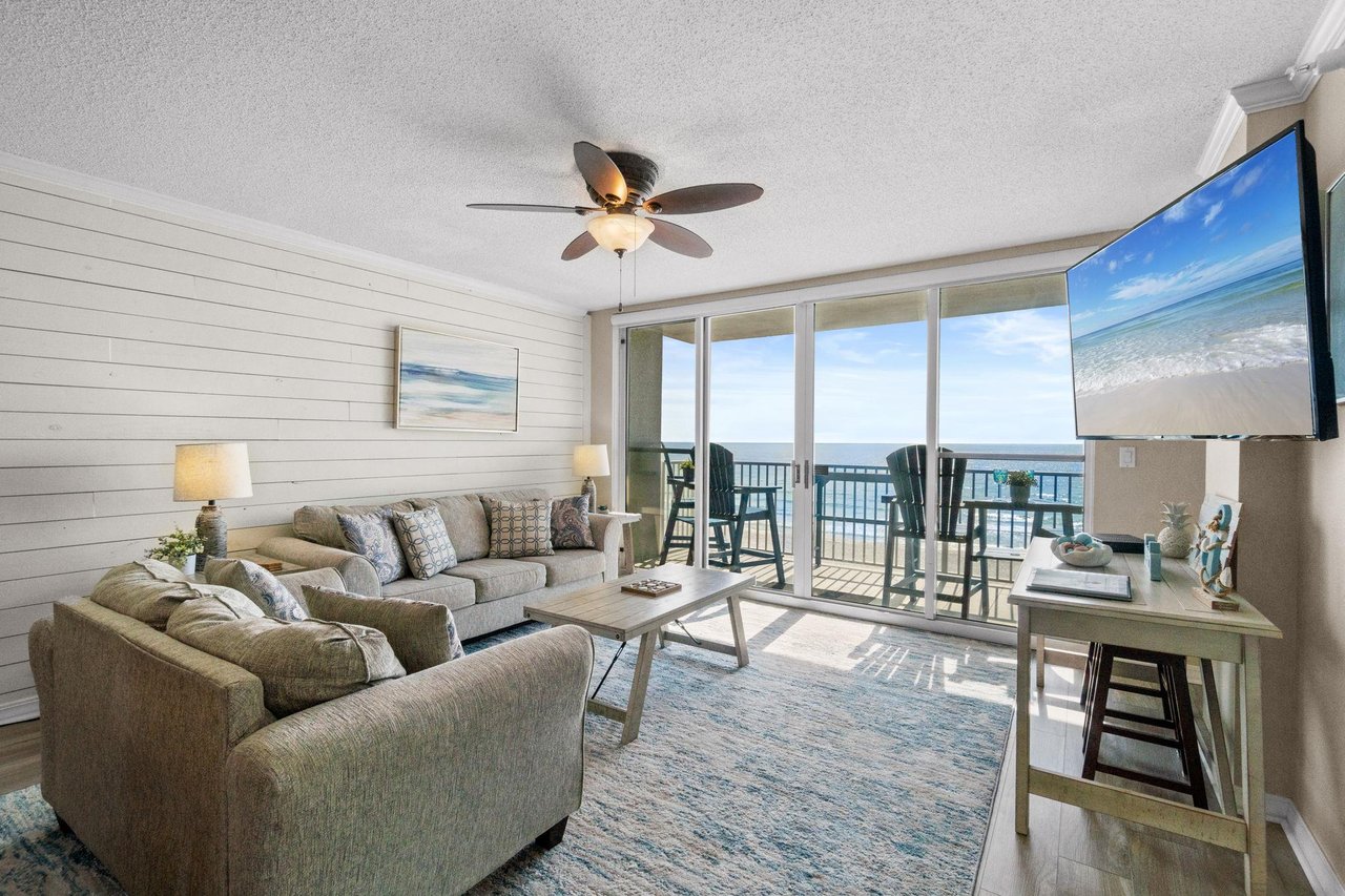 Living Room Bright and airy space with stunning beach views and comfy furnishings for relaxation