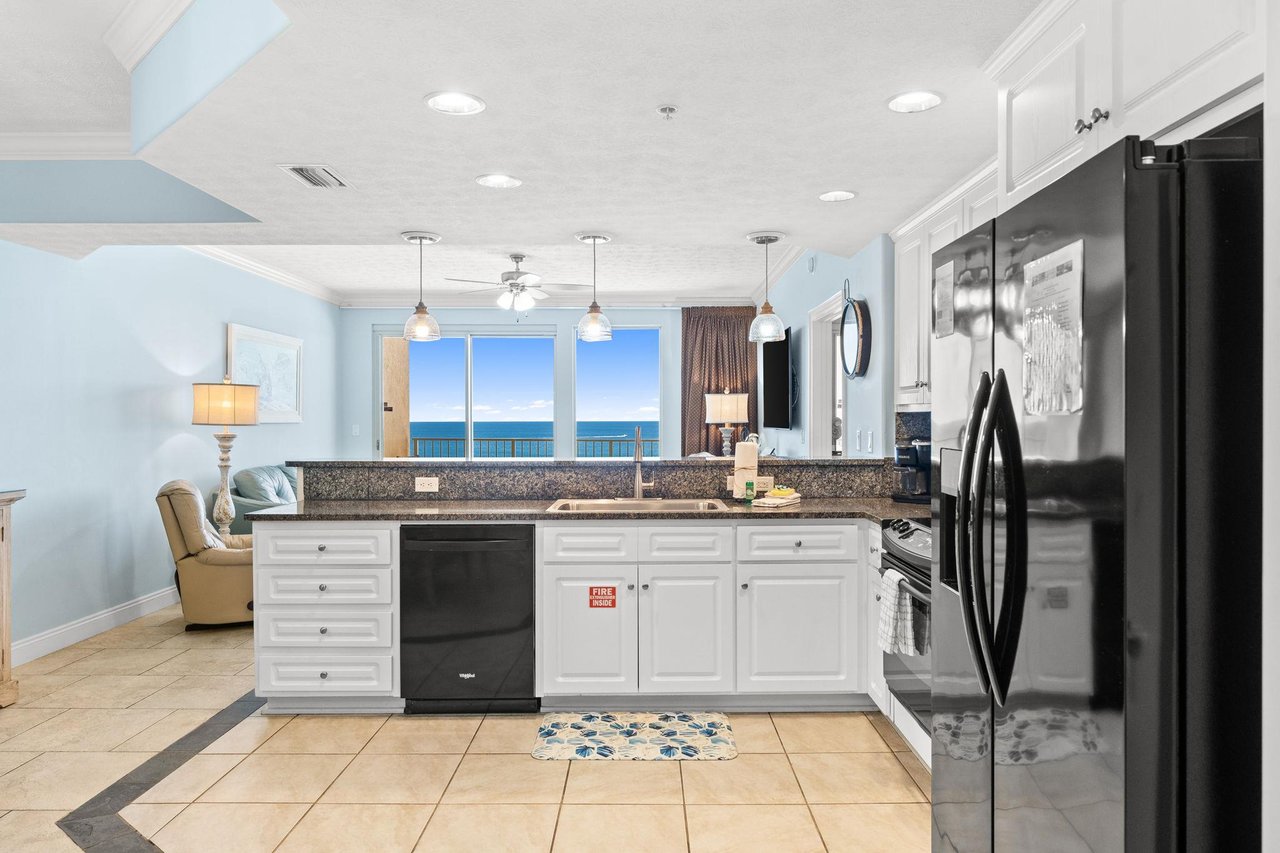 The fully equipped kitchen features granite countertops and has everything you need to prepare meals for family  friends.