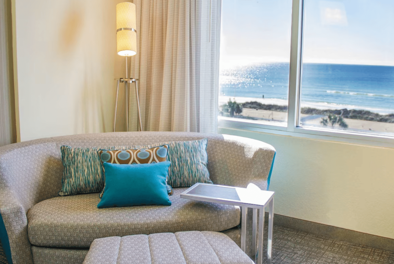 Inroom lounge area for viewing large flat screen TVs with premium channels