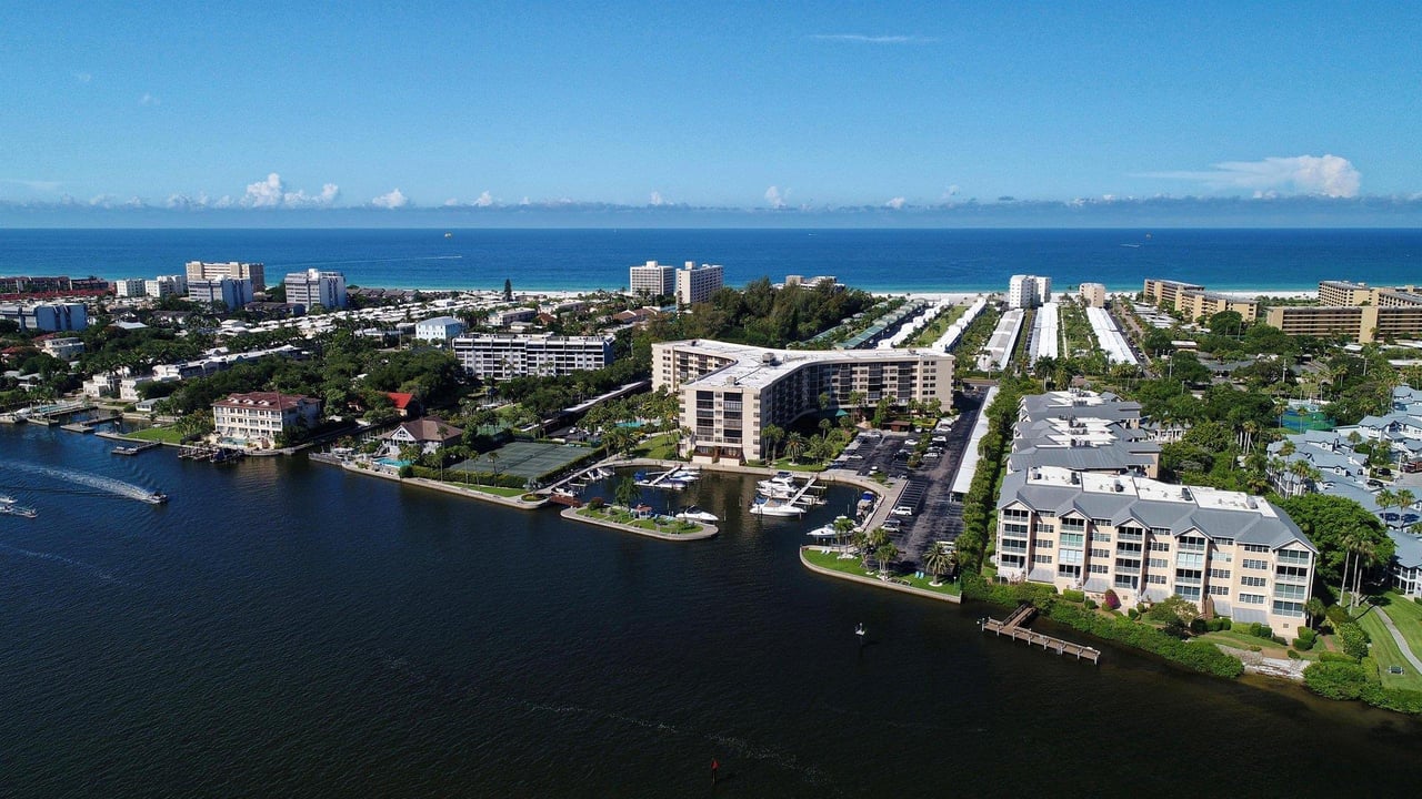 aerial view of Harbor Towers Yacht  Racquet club showing the propertys proximity to the beach and intercoastal waterway