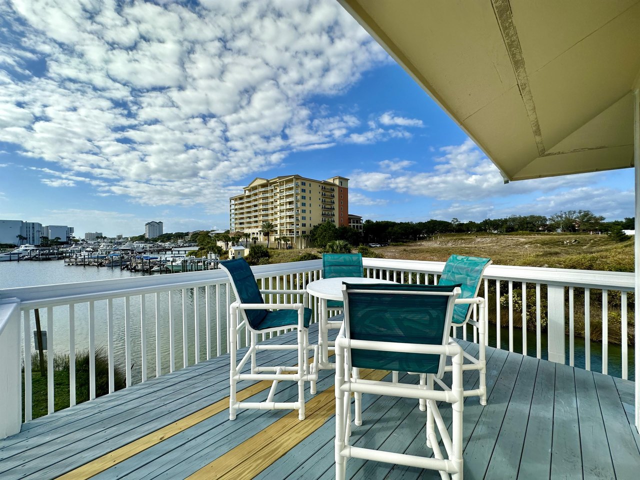 Sip your morning coffee on this waterfront deck, watching boats glide by as you plan your coastal adventures.