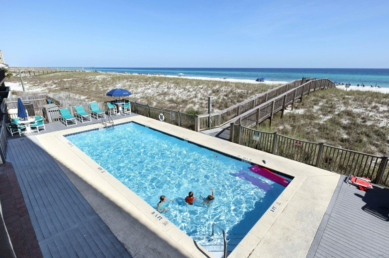 The beachfront, outdoor pool at Emerald Surf