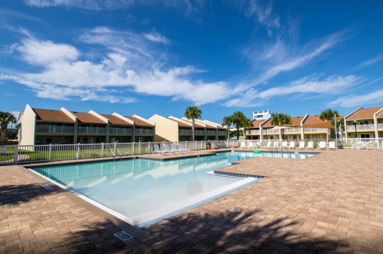 Many balconies look out over this pool