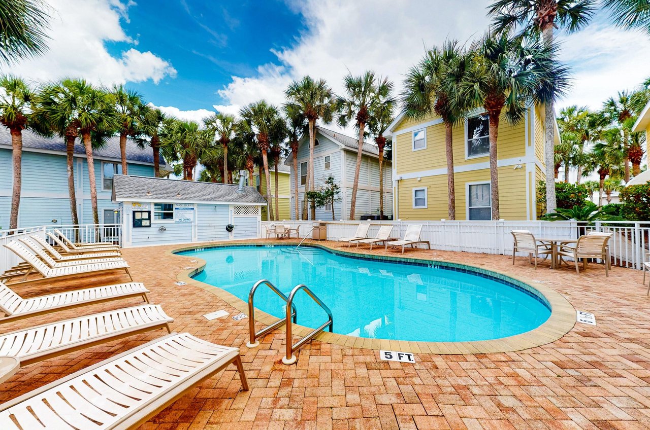 Community pool and loungers