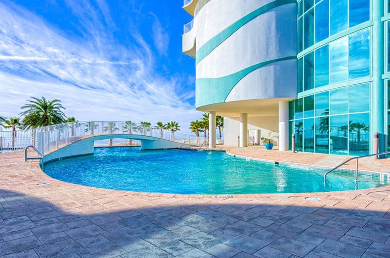 The large outdoor swimming pool in front of the condominiums at Turquoise Place