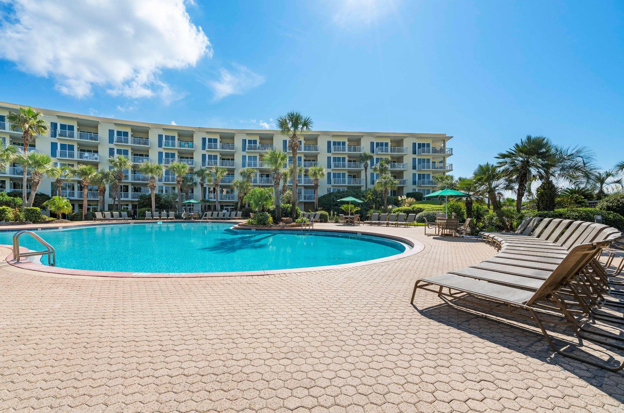 Crescent Condominiums balconies overlooking the community swimming pool.