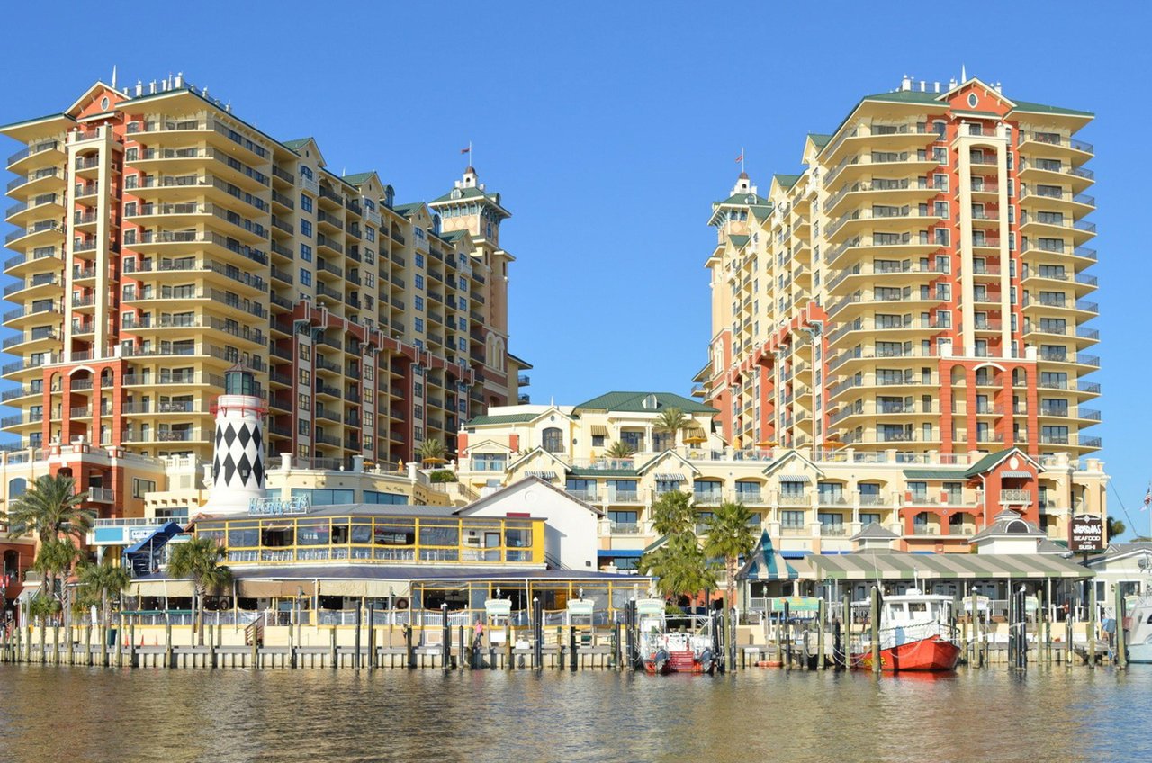 Emerald Grande is a mixture of highrise condo buildings, restaurants, and shops nestled beside the Destin Harbor.