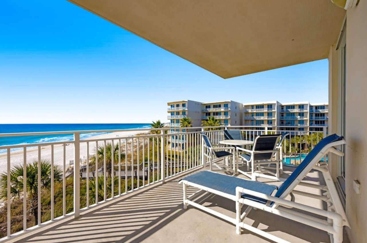 A lounge chair on a private balcony overlooking the Gulf at Waterscape in Fort Walton Beach Florida