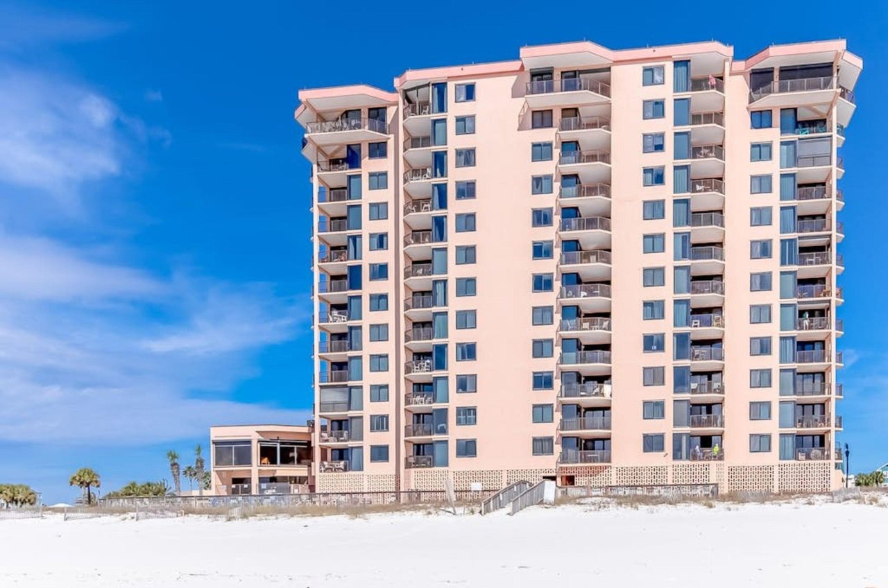 View from the beach of the Gulfside exterior of Broadmoor Condominiums