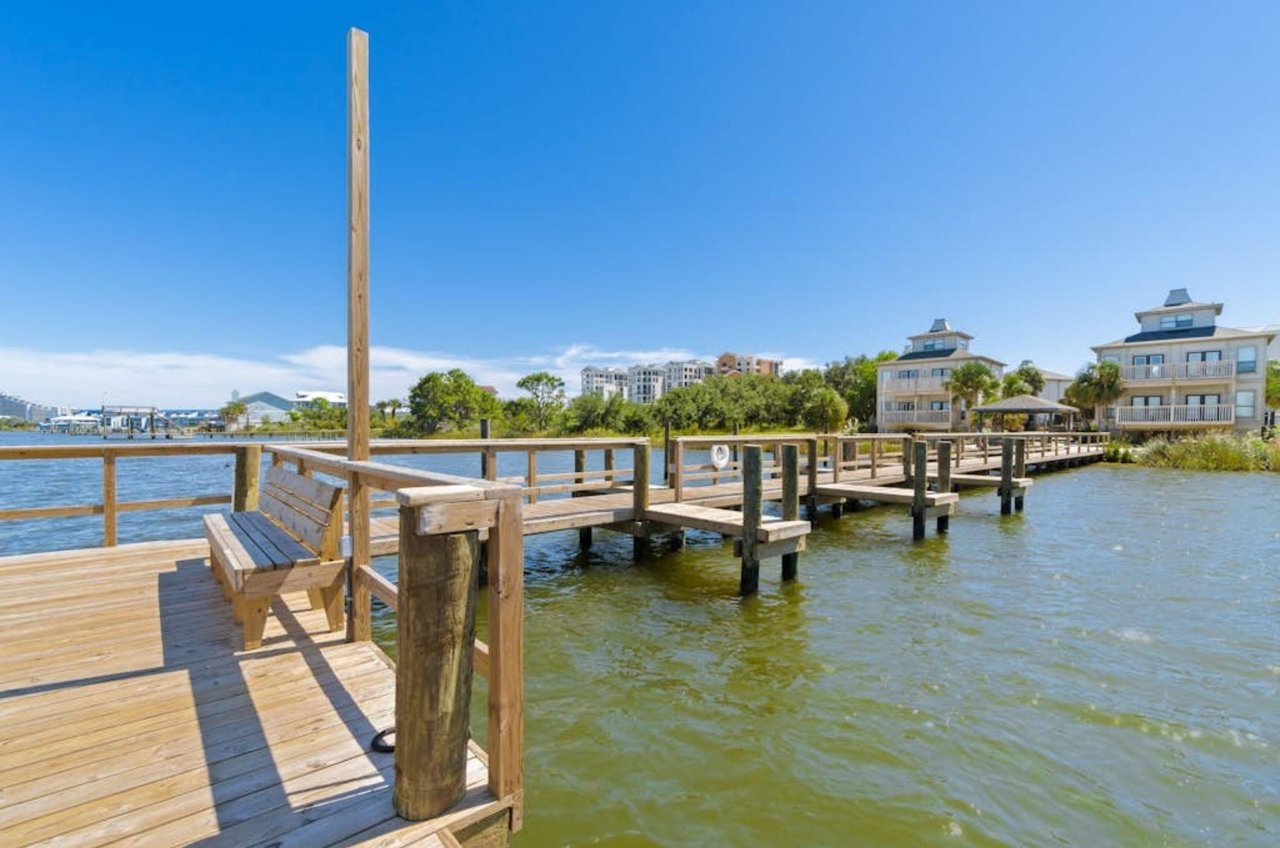 Boat docks on Ole River for guests at Molokai Villas
