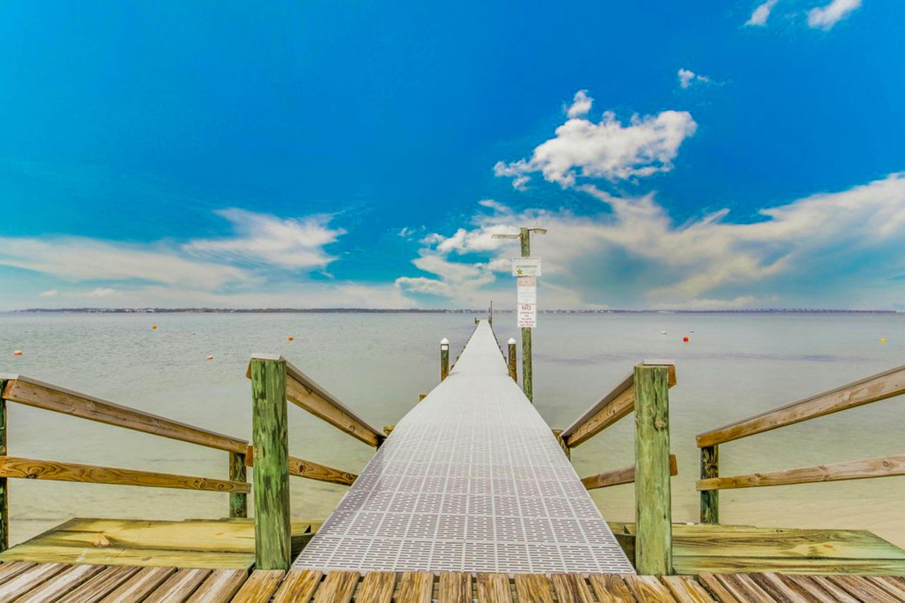 The property provides access to a private fishing pier on the Sound