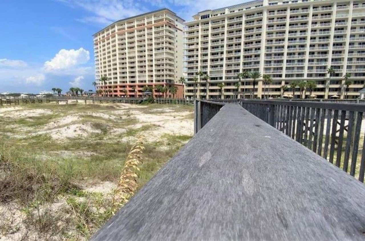 Boardwalk leading from the beach to Beach Club Resort