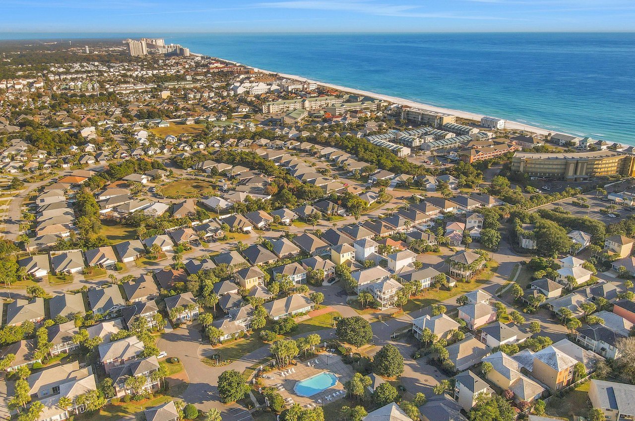 The community sits close to the beautiful Miramar Beach coastline.