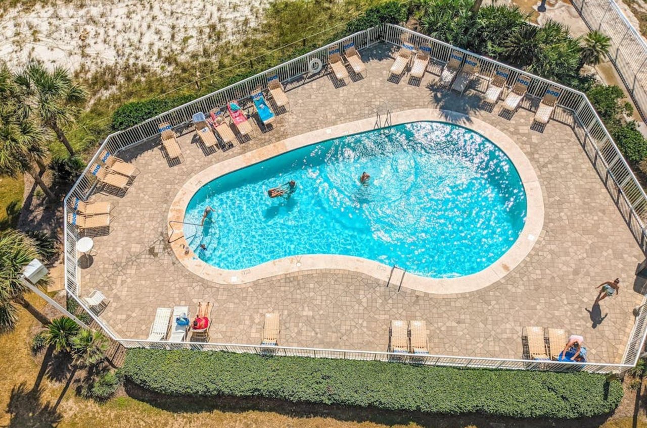 An overhead view of an outdoor swimming pool at Orange Beach Alabama