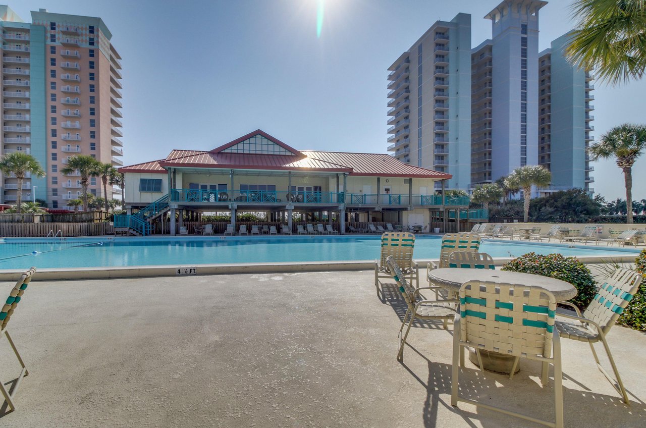The olympicsized outdoor swimming pool in front of the clubhouse at Santa Rosa Dunes