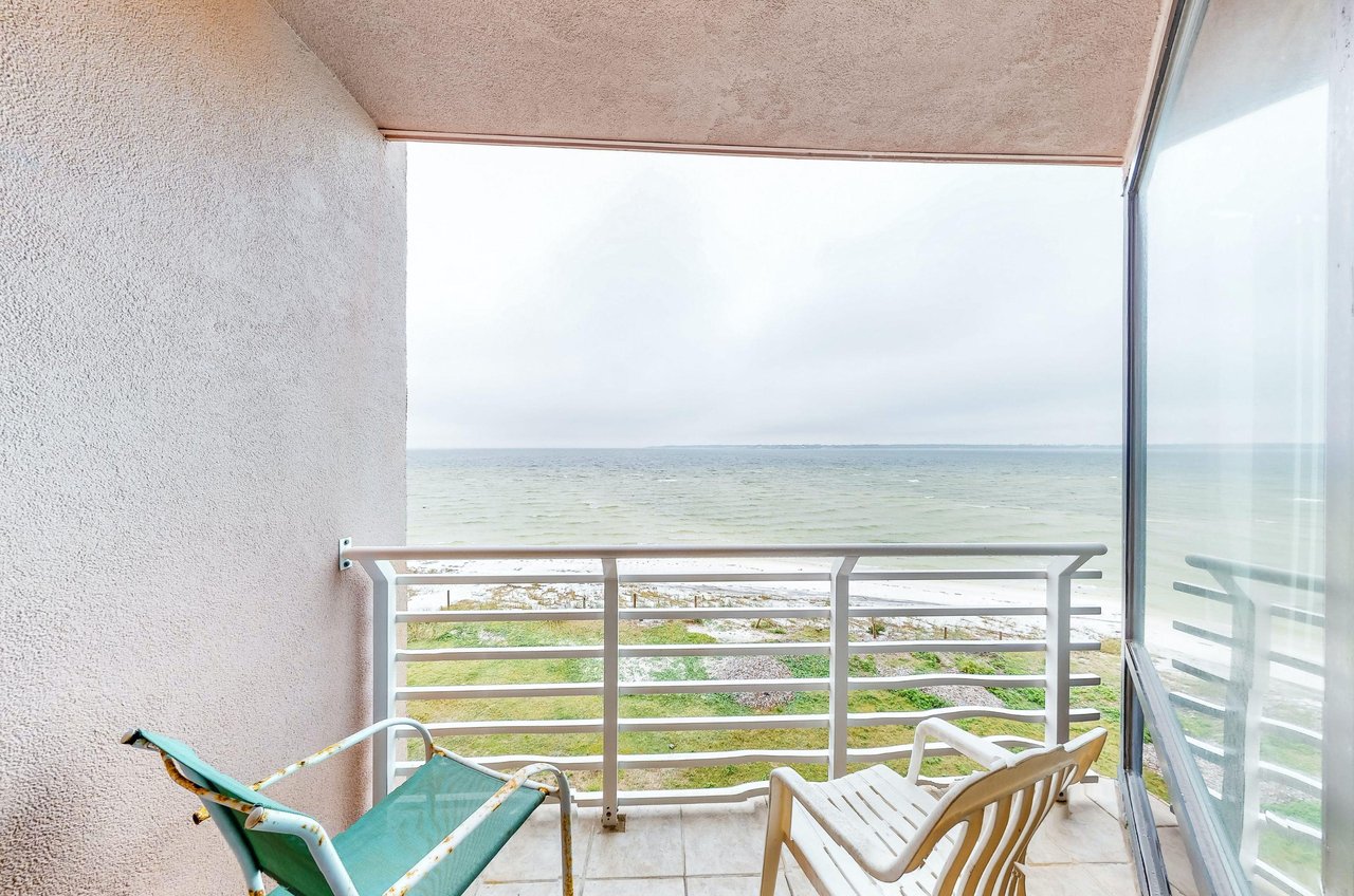 Unwind on a private balcony with Gulf views