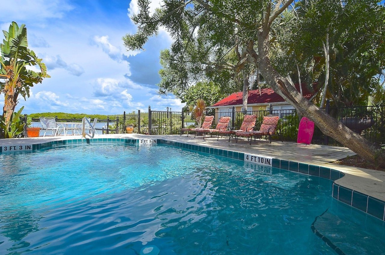 The outdoor pool and pool deck at the Inn at Turtle Beach in Siesta Key Florida