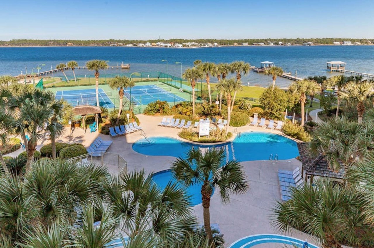 View from a balcony of the pool deck and Little Lagoon at Gulf Shores Surf and Racquet Club