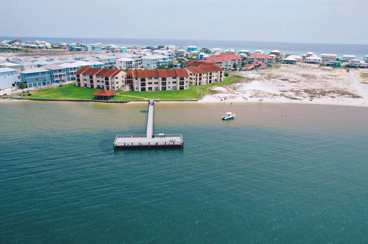 The property includes access to a fishing pier on the Sound