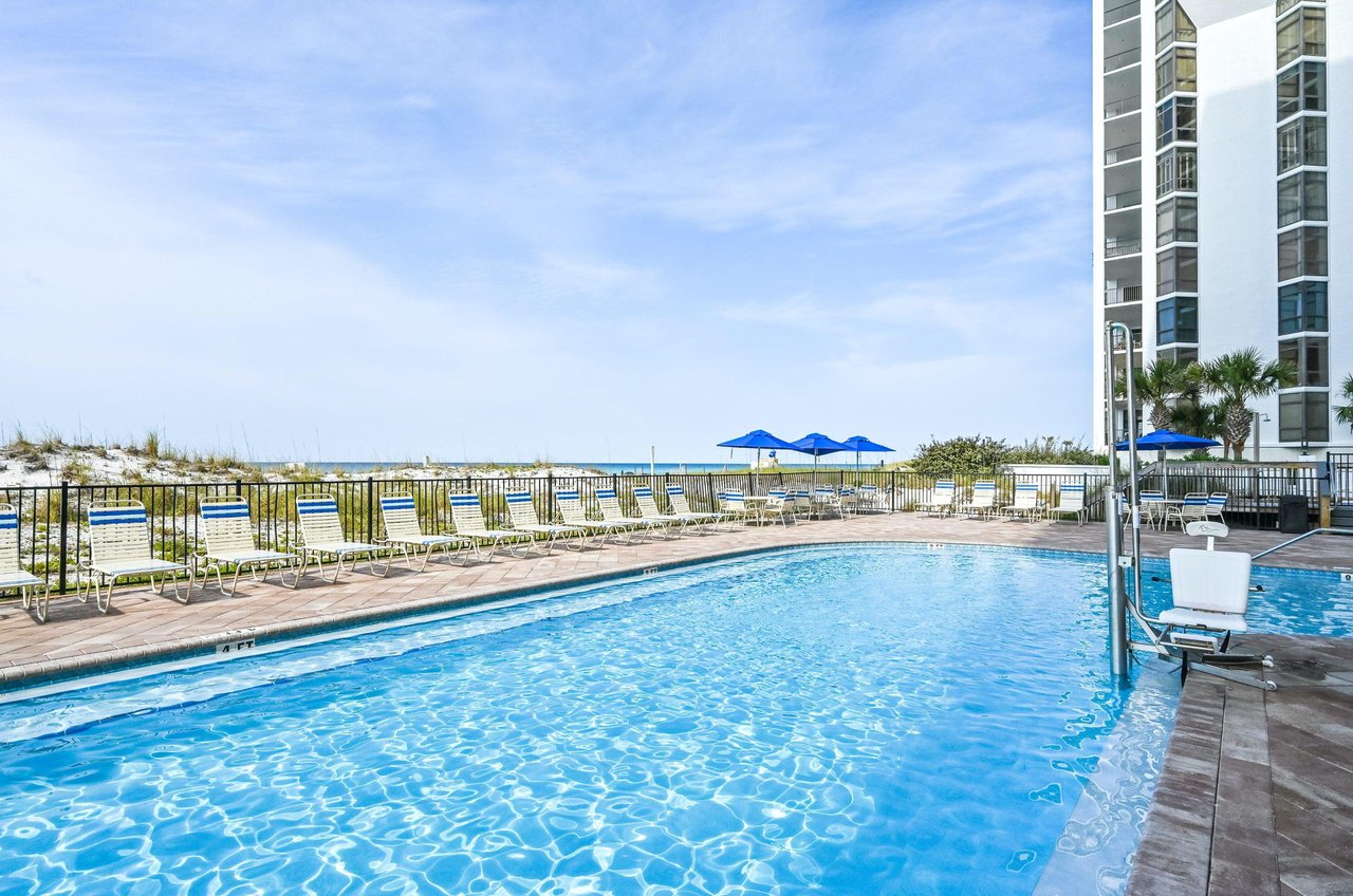 A St Martin Beachwalk Villas beachside pool with lots of loungers